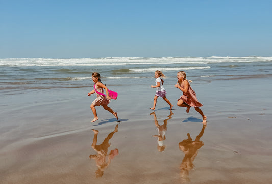 kids running at the beach