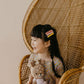 hair styles for little girls, pink flower, scallop, yellow star clip on long dark hair